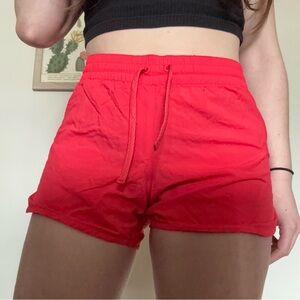 Columbia red/salmon running or hiking shorts